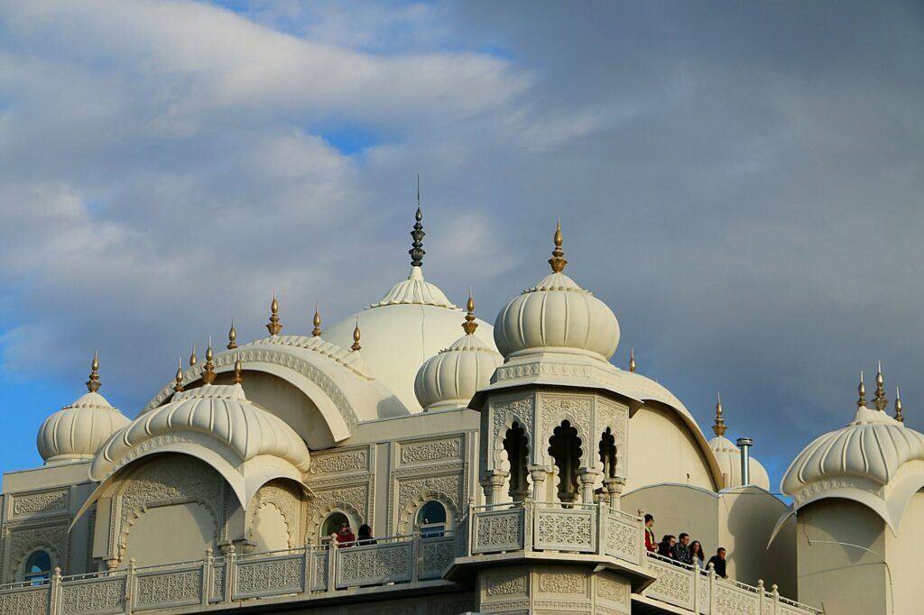 The majestic dome of the Sikh temple in London, showcasing stunning architecture against a summer sky.
